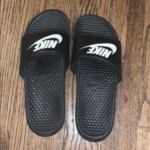 Black Nike slides